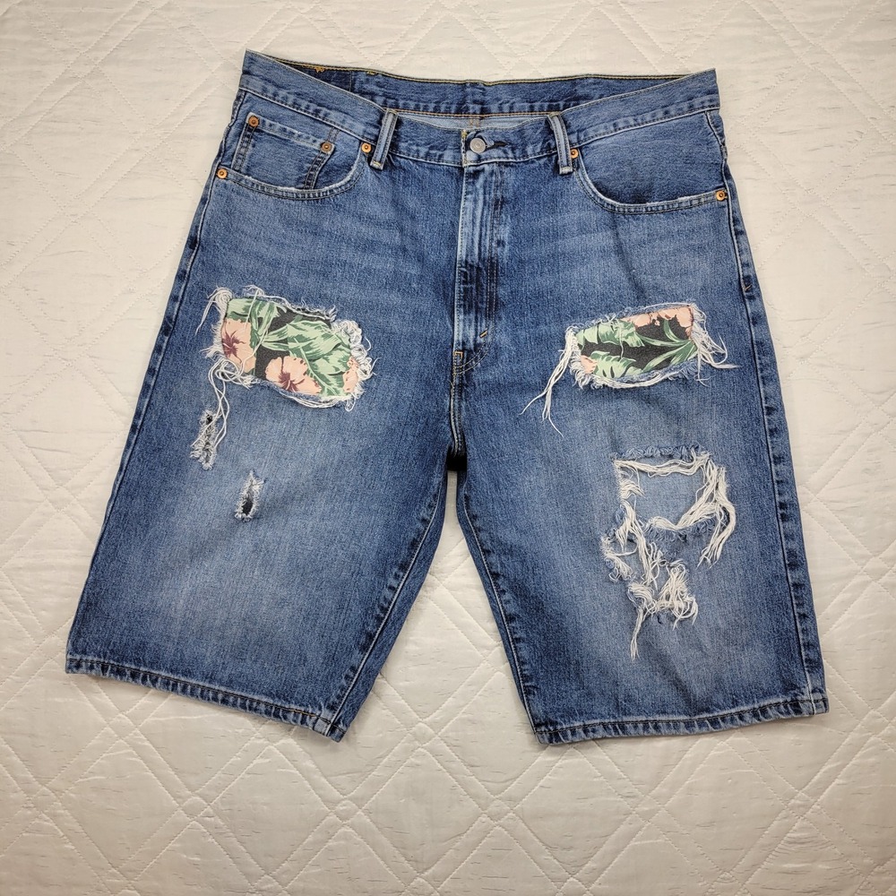 Levis 569 distressed jean shorts w/ tropical backing‎ size 38